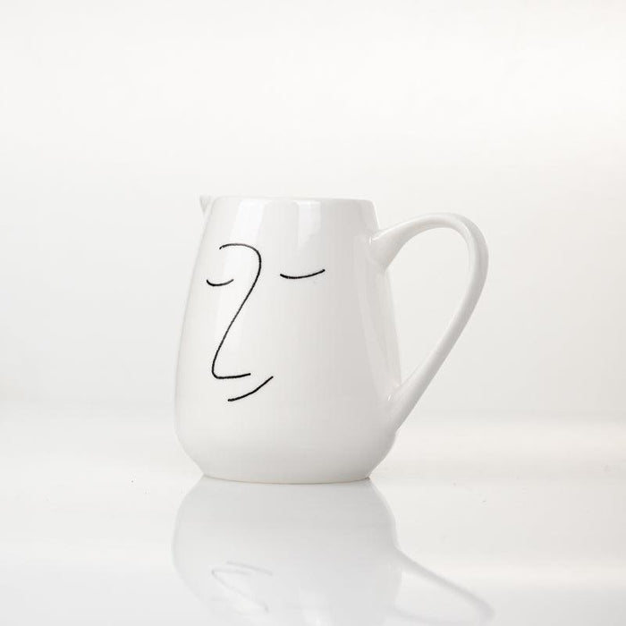 Faces of Felicity Flow Milk Jug